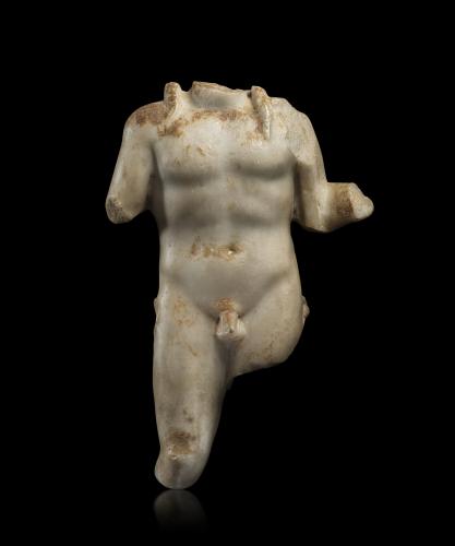 A Roman marble torso of Apollo