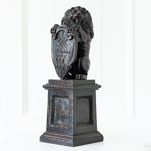 Charles I carved oak lion sejant