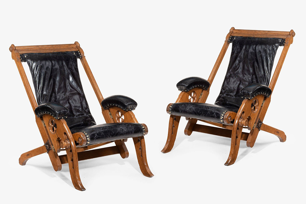 pair of reclining Gothic oak library chairs