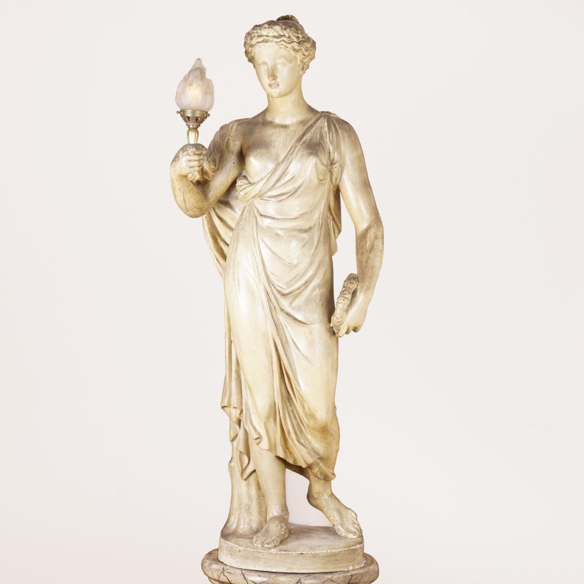 FIGURE OF FLORA HOLDING A LAMP
