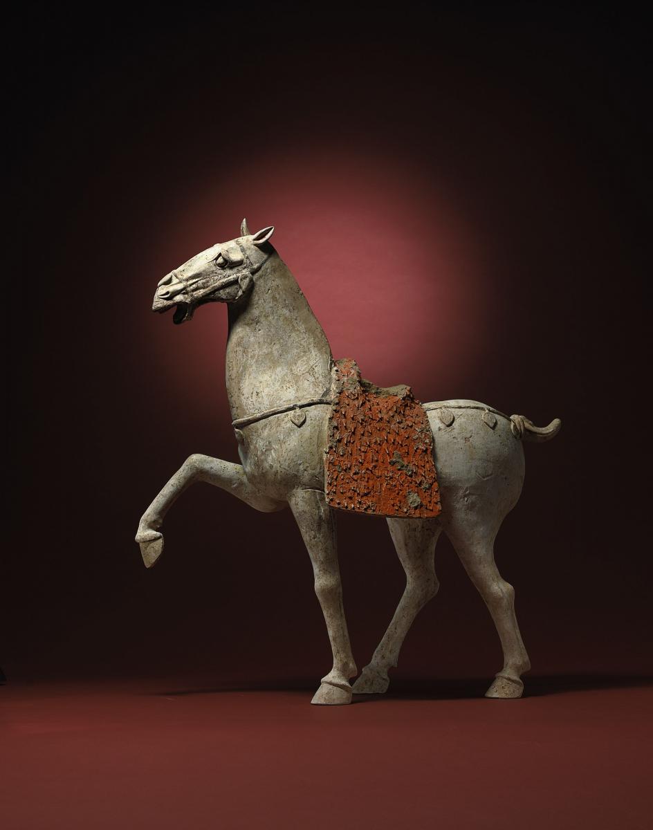 A Fine Chinese Terracotta Model of a Prancing Horse Tang Dynasty
