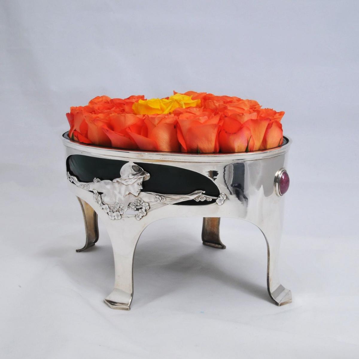 A large fruitbowl or flower centrepiece by Kate Harris