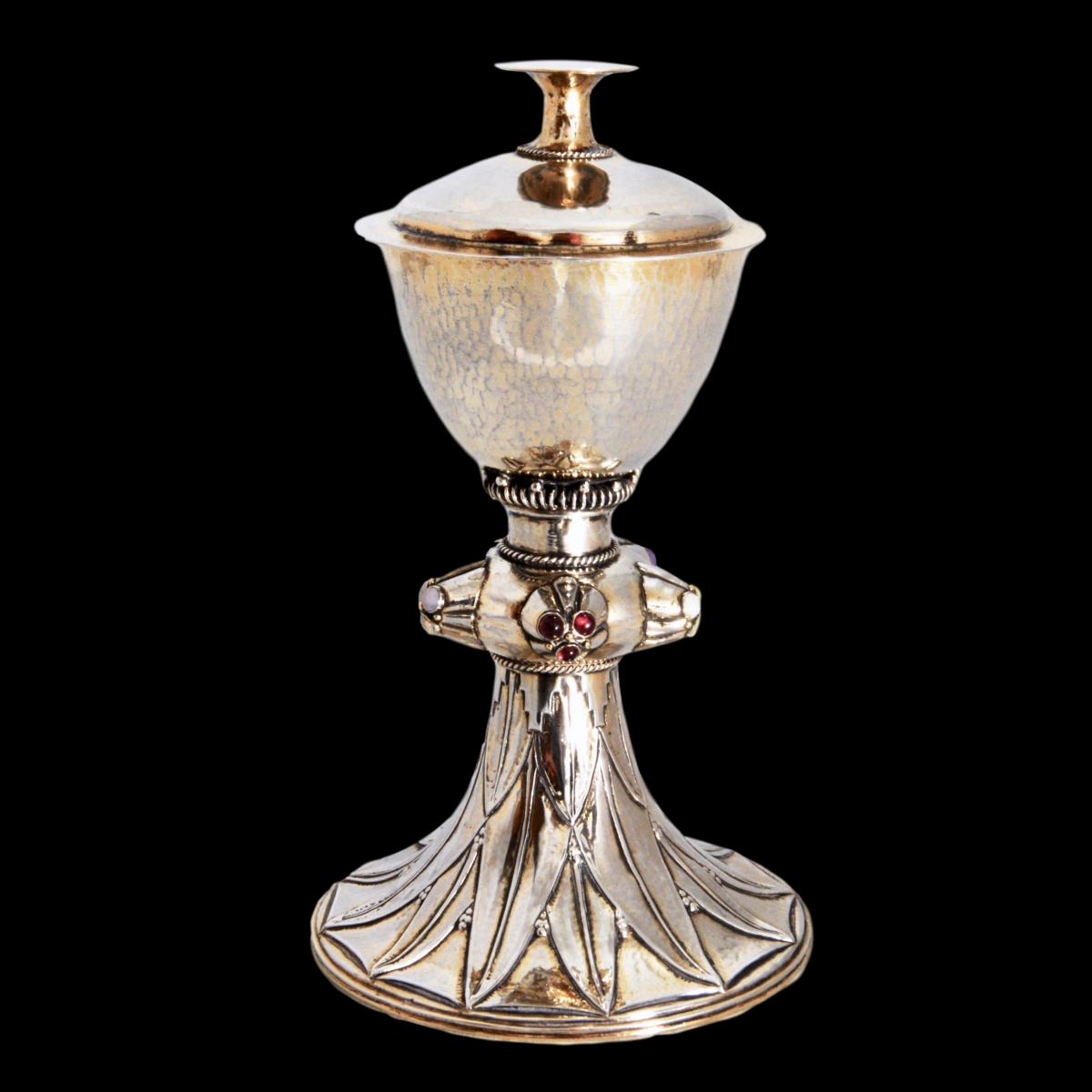 A gem set silver gilt arts and crafts chalice by Edward Spencer for the Artificers Guild