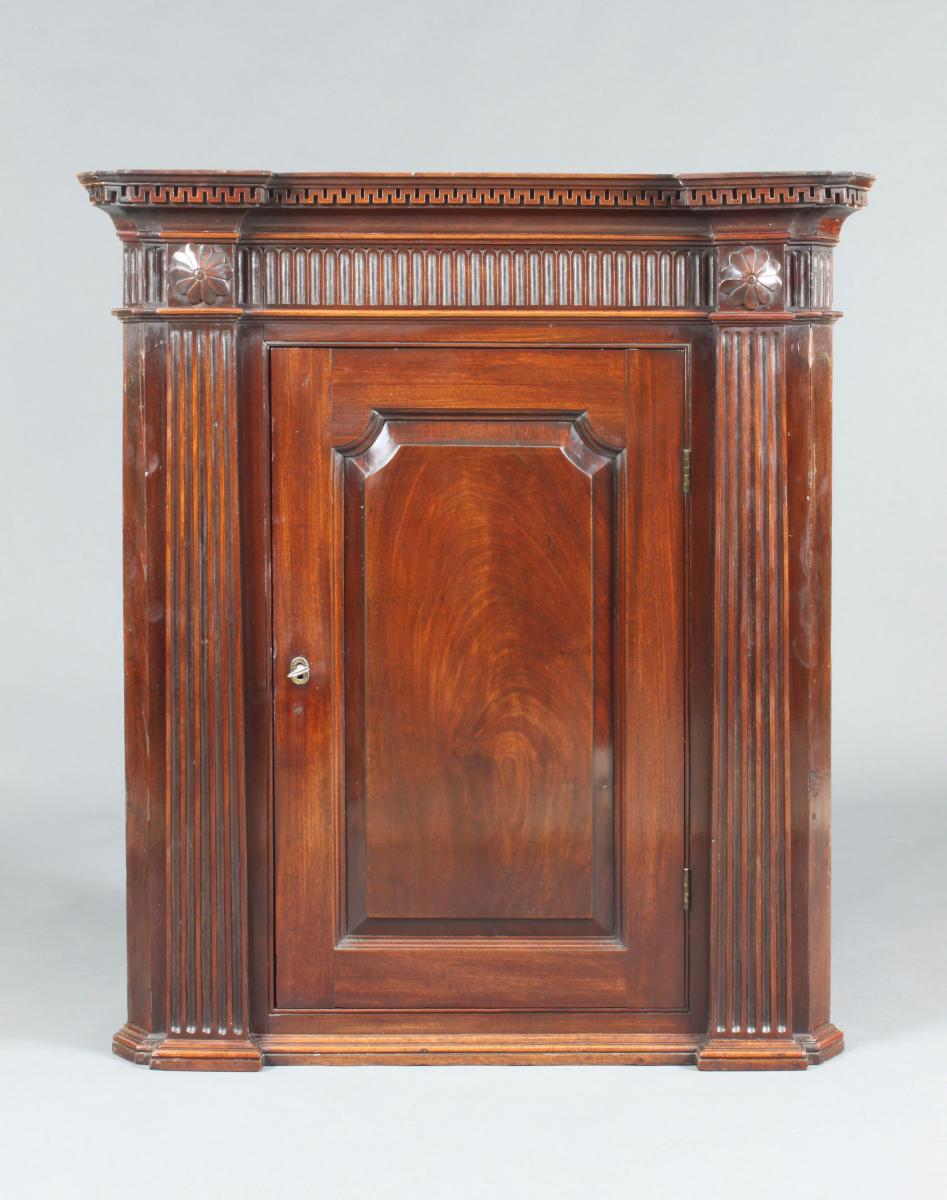 Antique mahogany corner cupboard