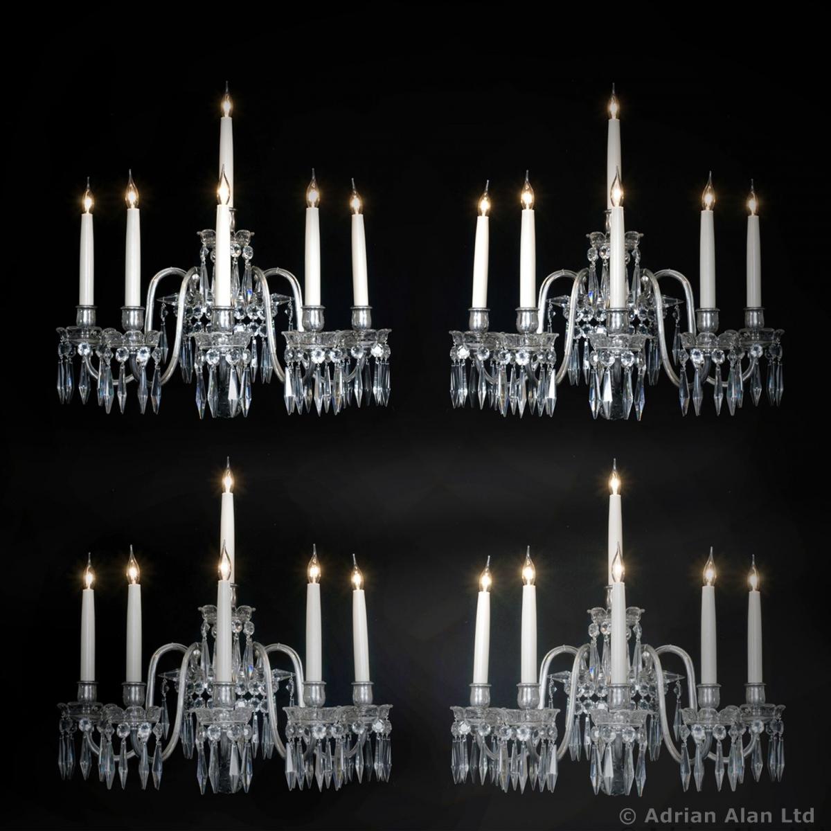 A Set of Four Cut Crystal Six-Light Silvered Wall Appliques