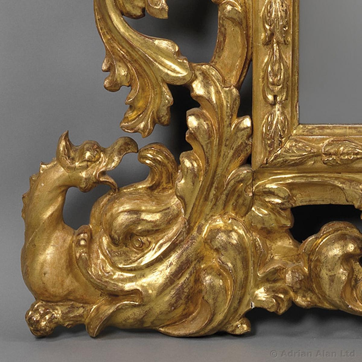 A Baroque Style Carved Giltwood Mirror