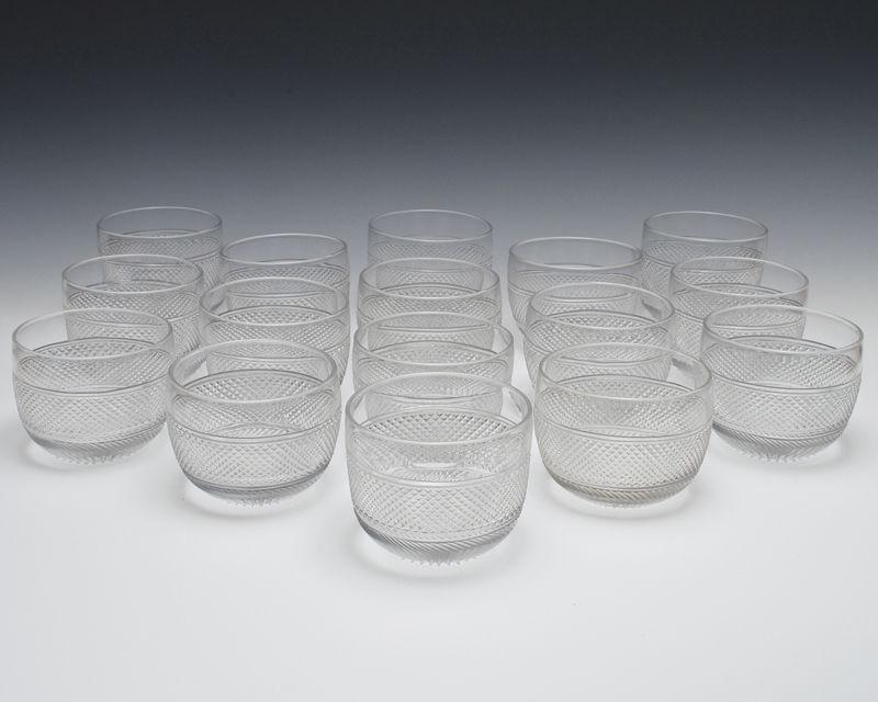 A fine set of sixteen diamond cut glass Regency finger bowls