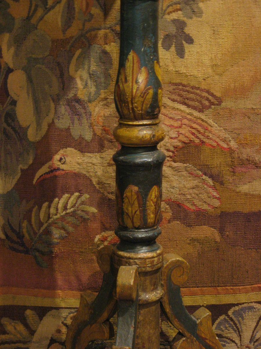 17TH CENTURY ITALIAN POLYCHROMED STANDING CANDLESTICKS WITH TRIFORM BASES. C1680