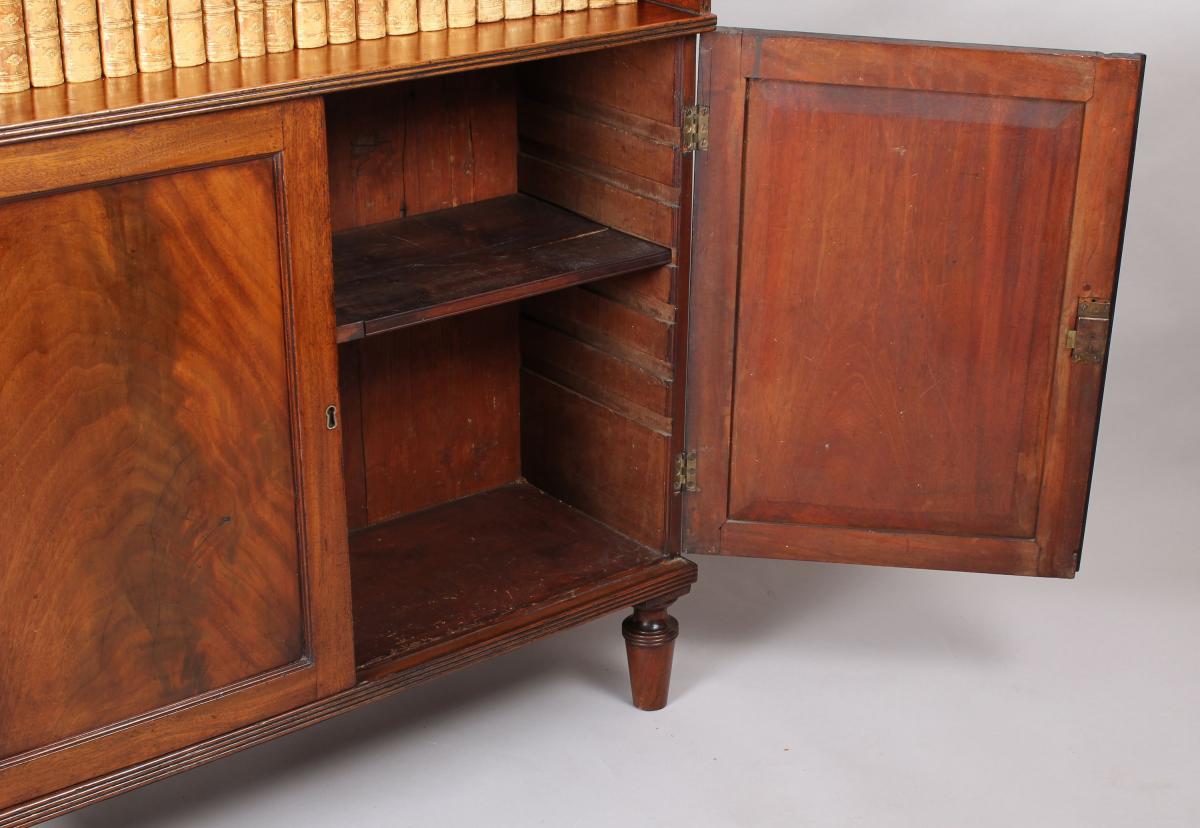 George IV period mahogany bookcase-cabinet