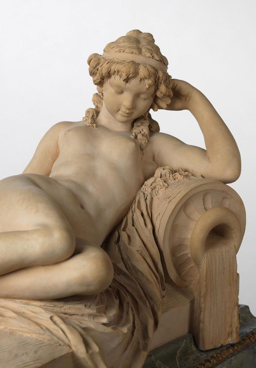 A Terracotta Figure of a Reclining Nymph