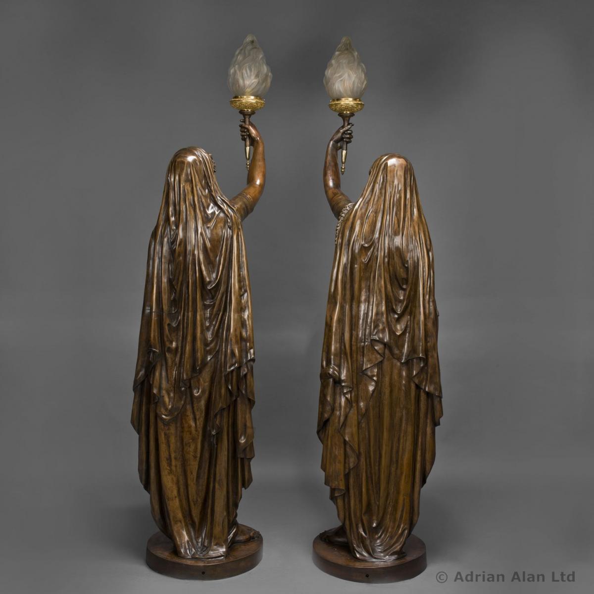 Patinated Bronze Figural Torcheres