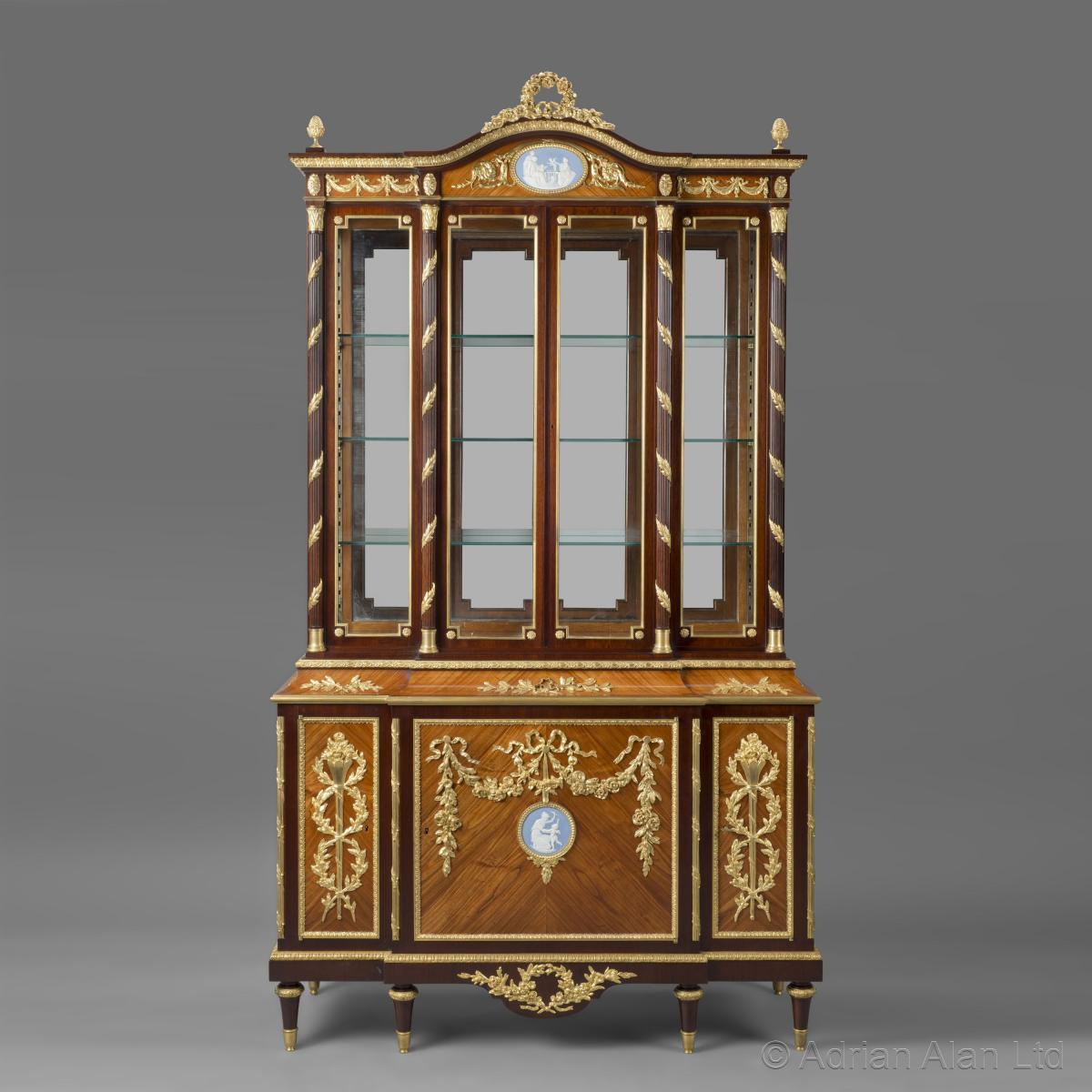 A Louis XVI Style Display Cabinet With Wedgwood Porcelain Plaques