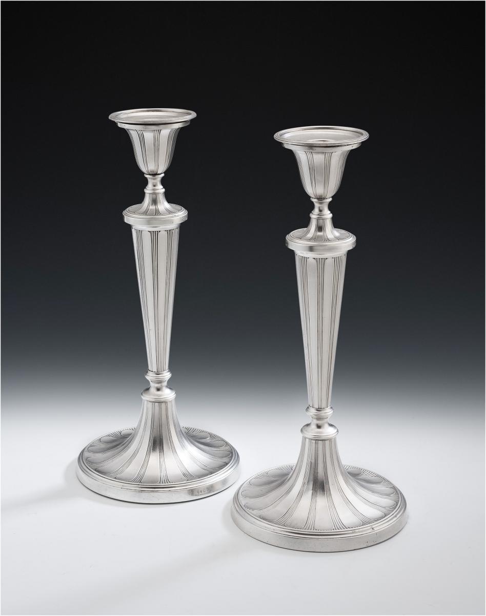 A fine & unusual pair of George III Sterling Silver Candlesticks made in Sheffield in 1790 by Tudor & Leader