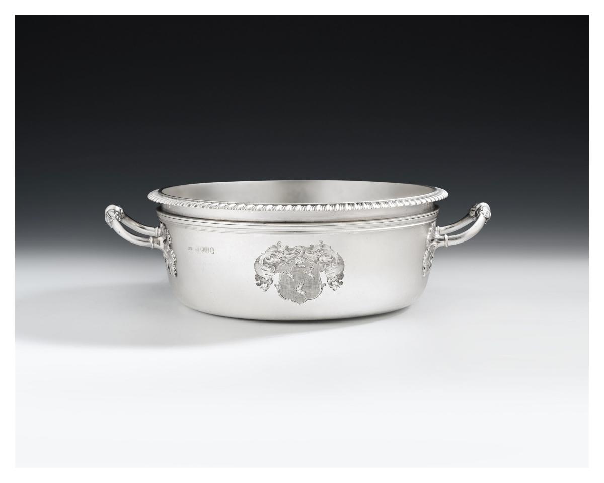 A George IV antique sterling silver souffle dish made in London in 1830 by William Eaton
