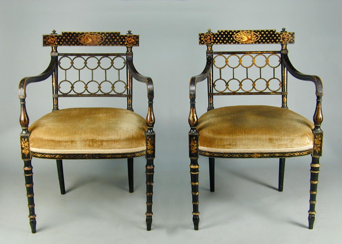 Pair Regency armchairs with original black and gilt decoration, c.1810