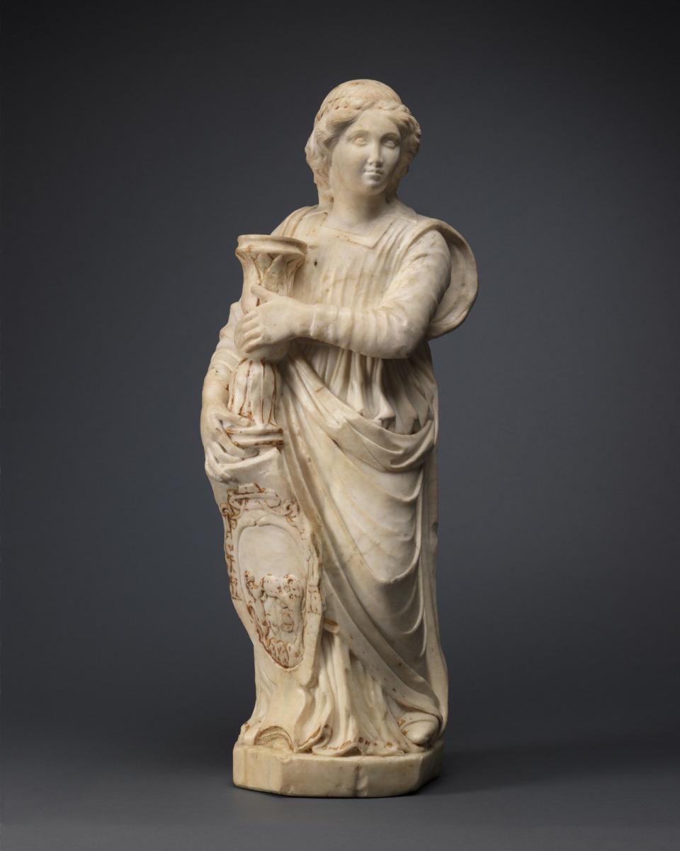 Circle of Domenico Gaggini (Bissone c. 1425-1426 – 1492 Palermo) Angel Holding Candlestick White marble, with traces of original