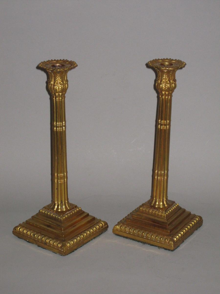 RARE MERCURIAL GILDED OLD SHEFFIELD PLATE CANDLESTICKS. BY JOHN HOYLAND & CO