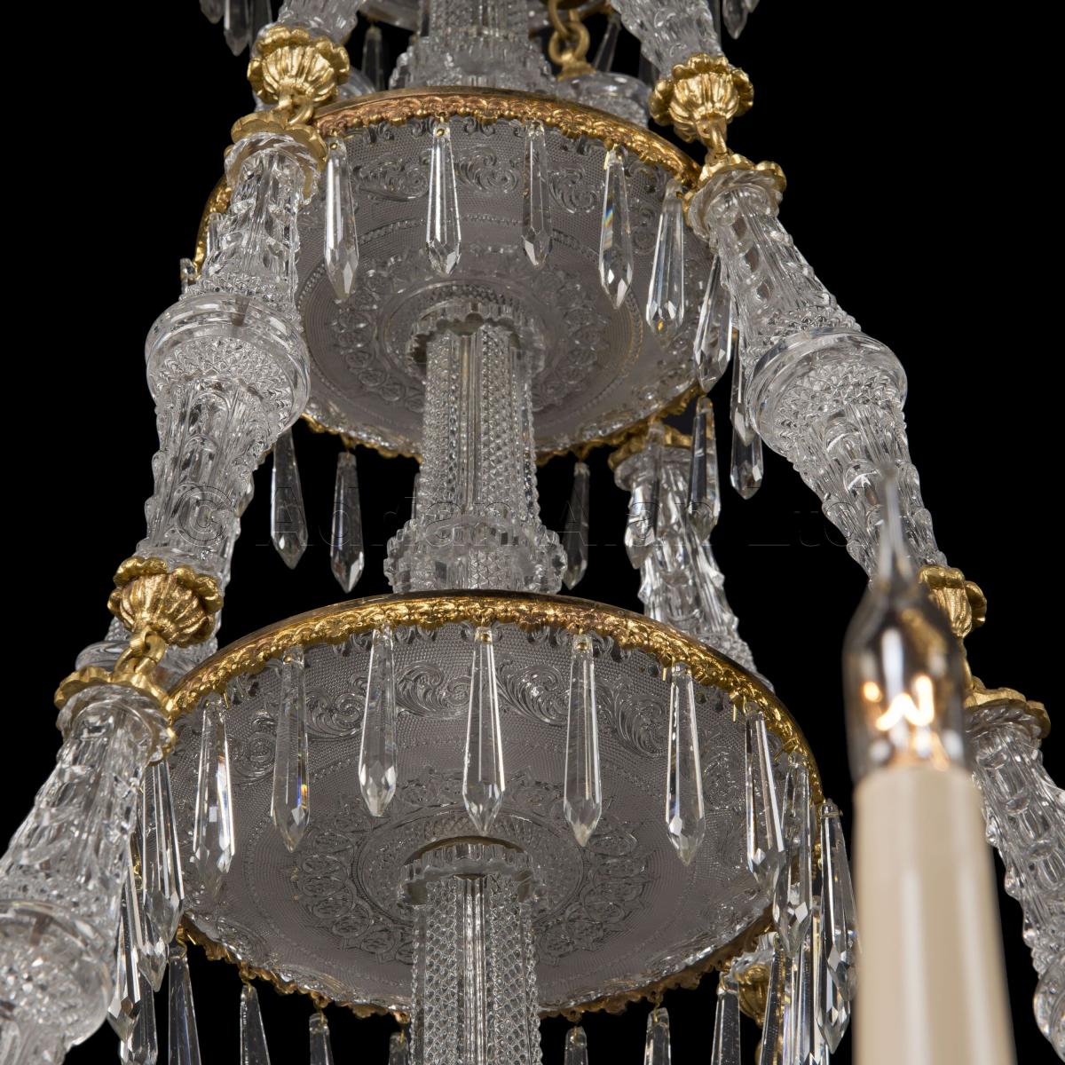 An Important Pair of Eighteen-Light Engraved Glass Chandeliers By Baccarat