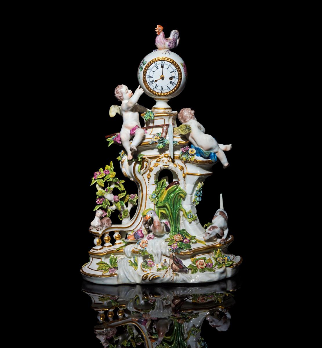 An important Chelsea clock-case with allegorical elements representing Dawn