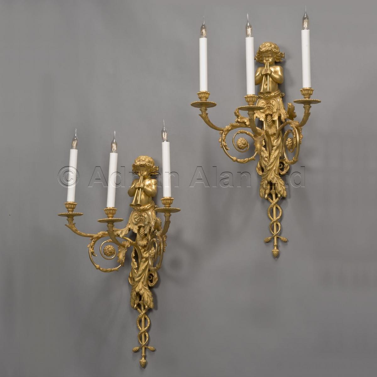 A Pair of  Louis XVI Style Three-Light Wall-Appliques After Jean Hauré ©AdrianAlanLtd