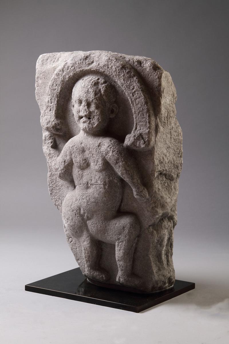 Rare Irish Celtic Limestone Slab Carved with a Relief of a Youthful Dancing Deity