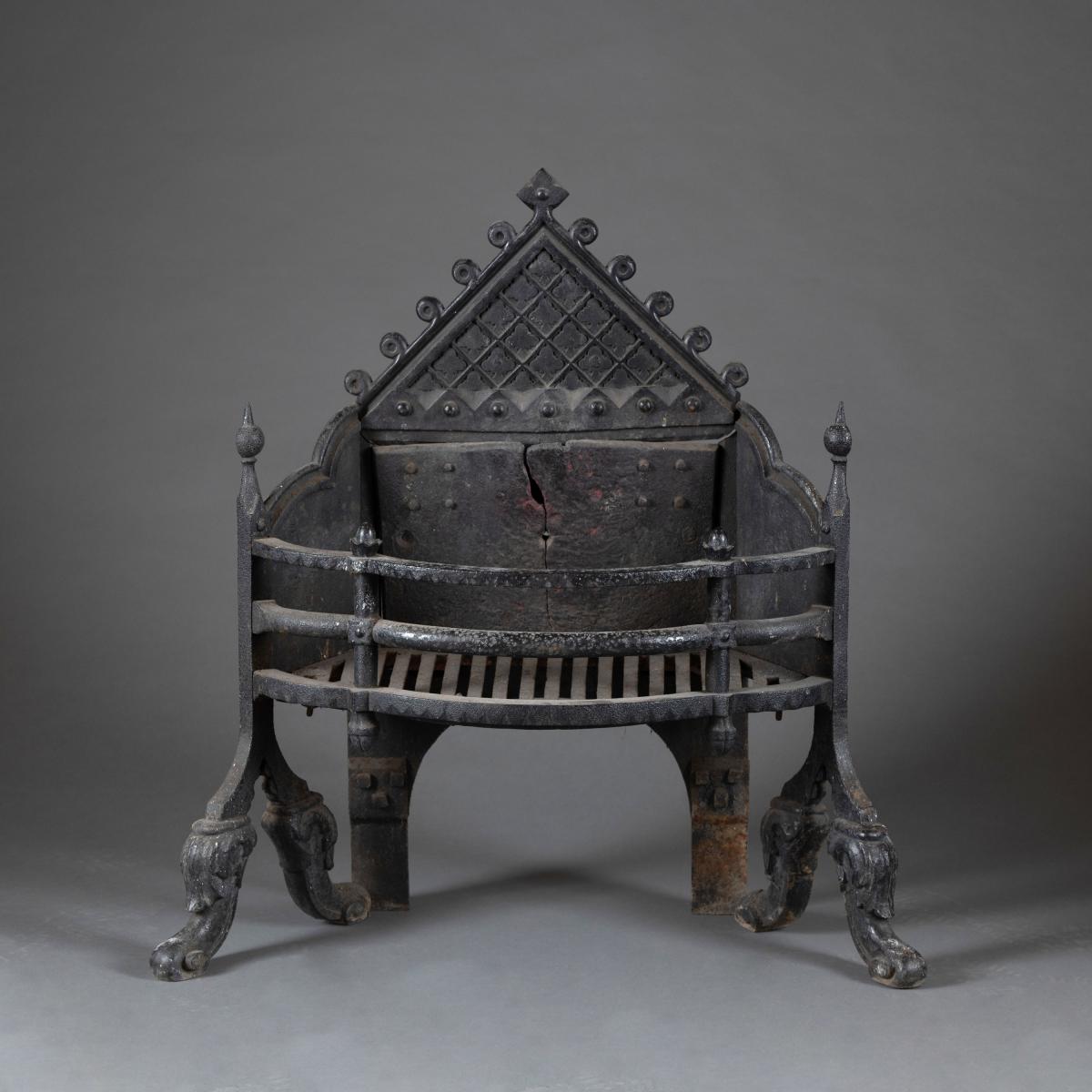 19th century English Gothic style wrought iron firegrate