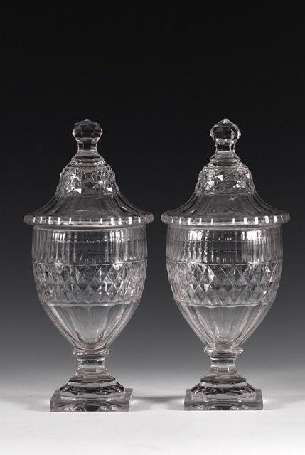 A pair of covered urns