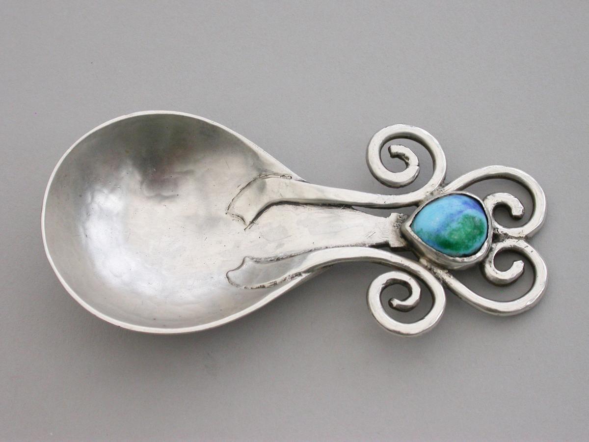 Arts & Craft Cast Silver Caddy Spoon - Enamel Boss. By Ramsden & Carr, London, 1909