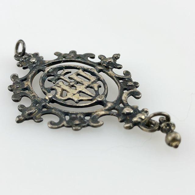 Pierced silver IHS pendant. Spanish, late 16th / early 17th century