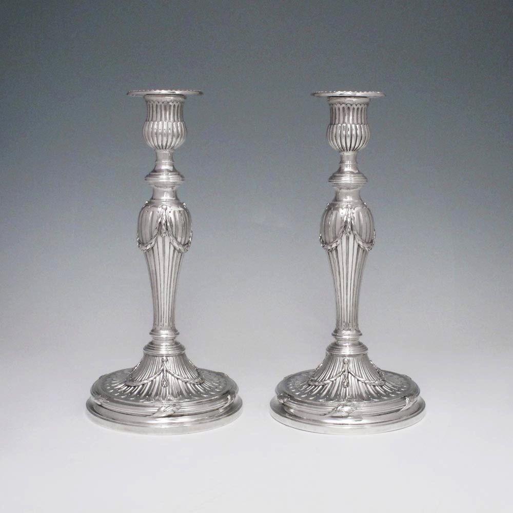 A Pair of George III Antique English Silver Candlesticks