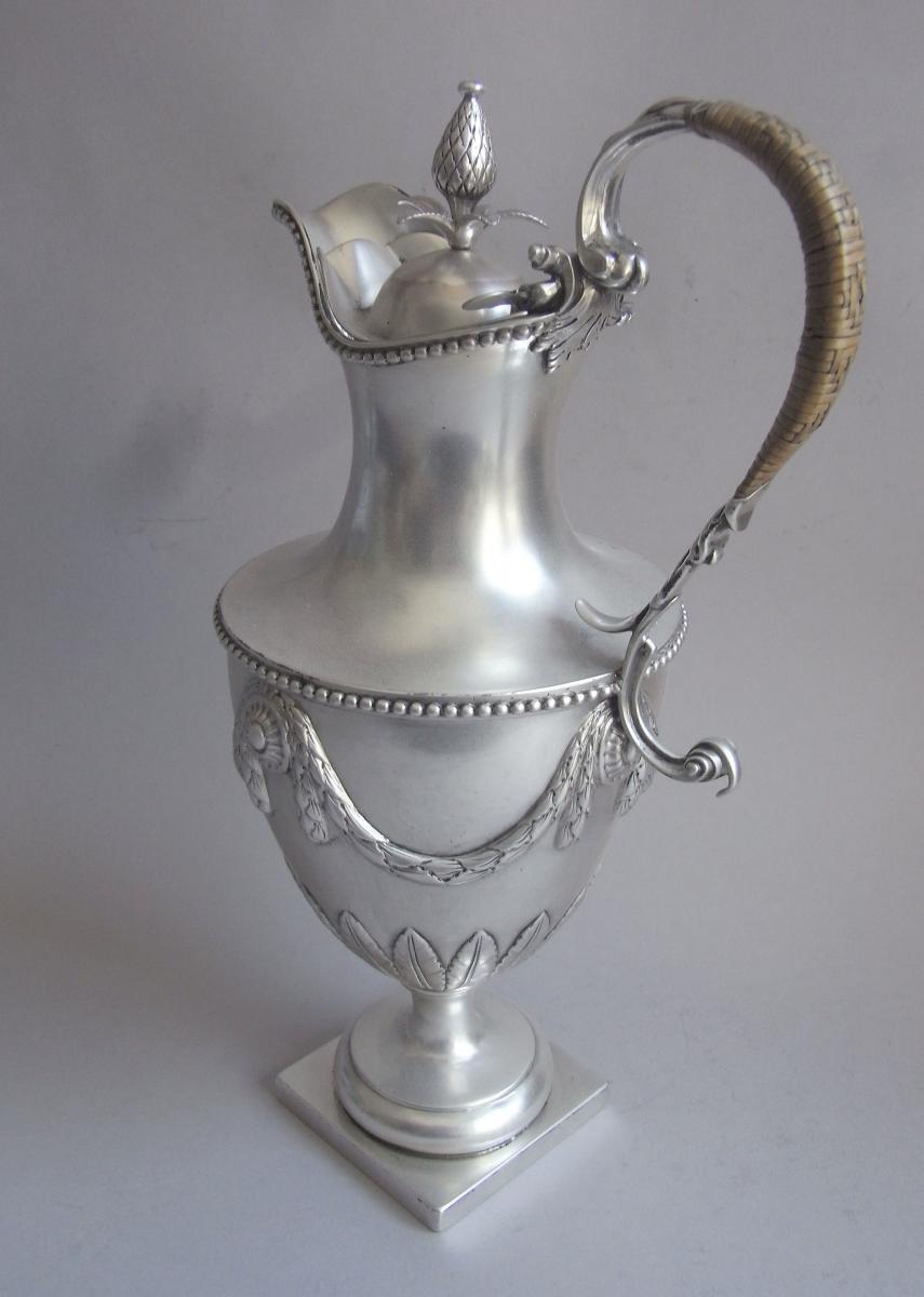 An exceptional & very rare George III Neo Classical Water/Wine Ewer made in London in 1768 by John Carter II. The decorative des