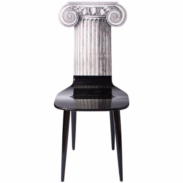 A Piero Fornasetti chair “Capitello Ionico.”