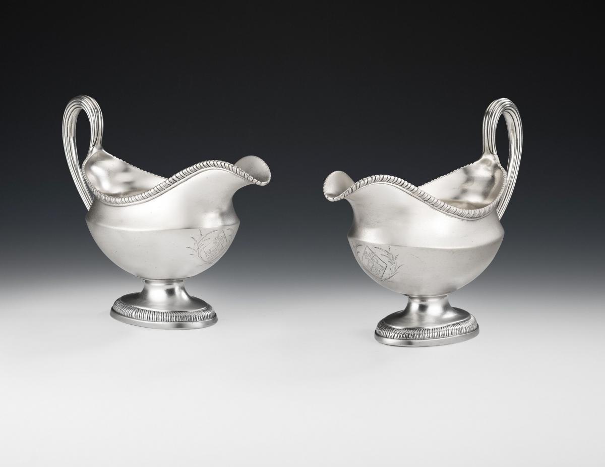 A very fine pair of George III Cast Sauceboats made in London in 1774 by Parker & Wakelin