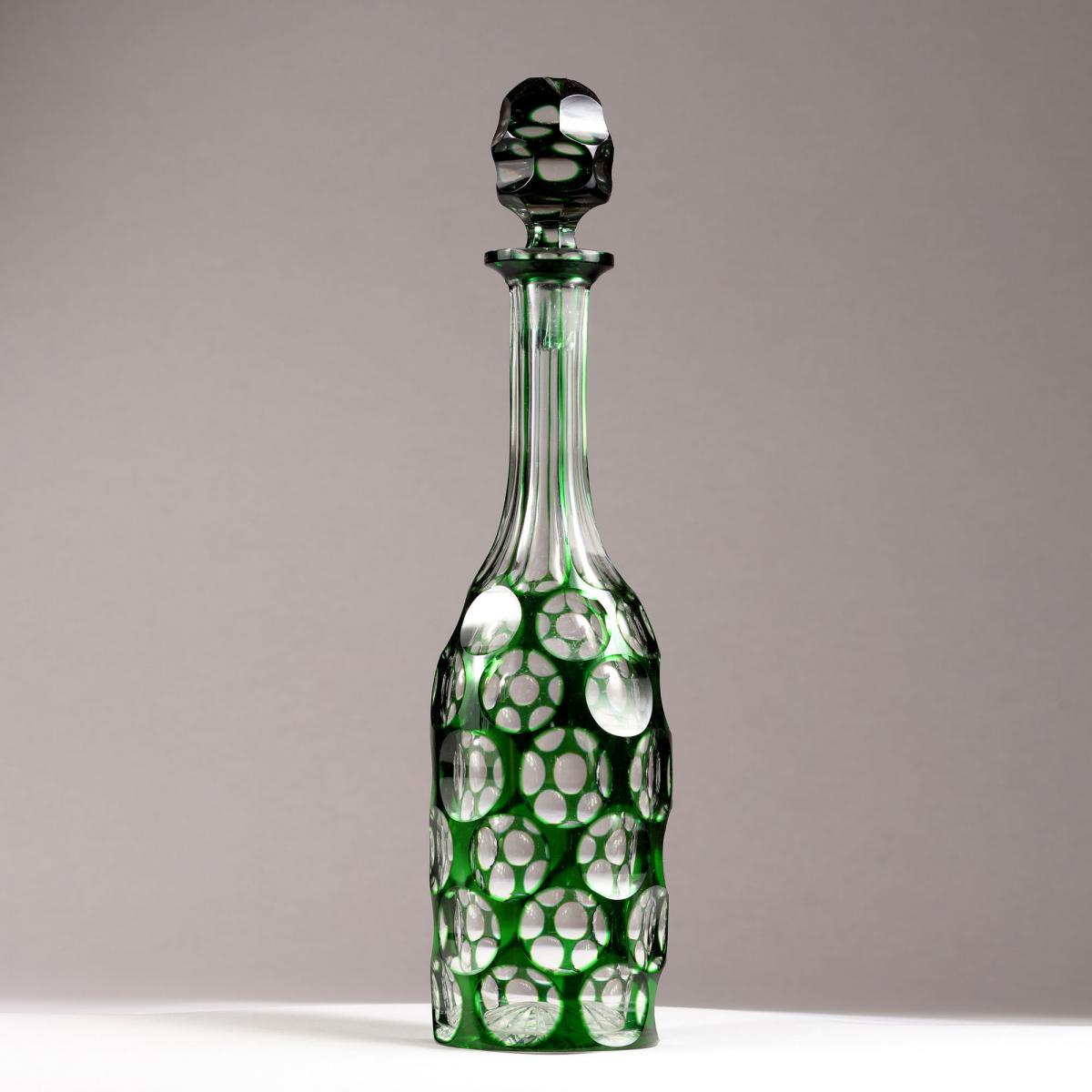 A cut glass bottle