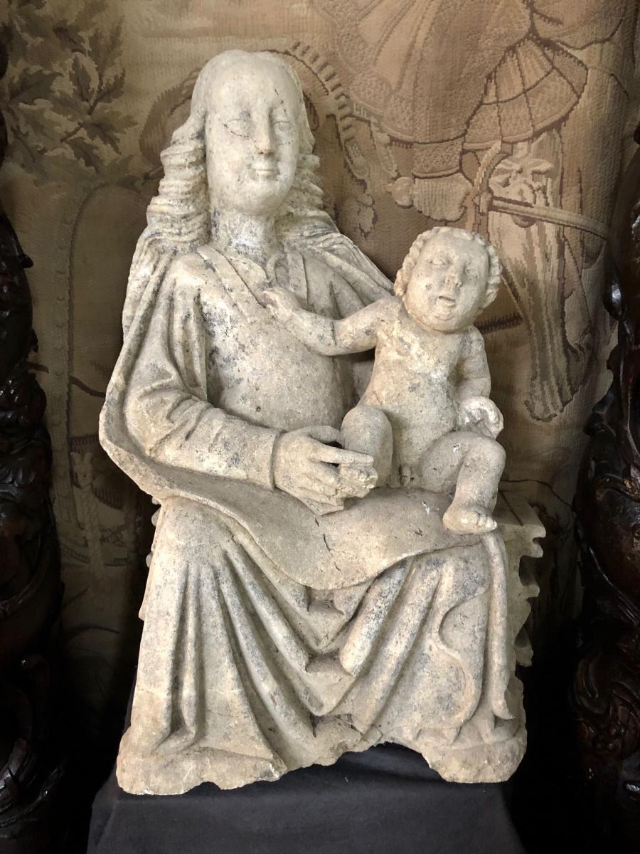Seated Madonna with Six Fingers