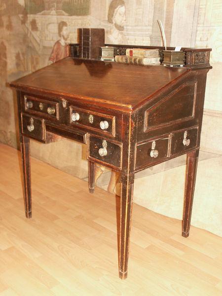 An unusual, late-18th century, mahogany estate bureau fitted with numerous secret drawers