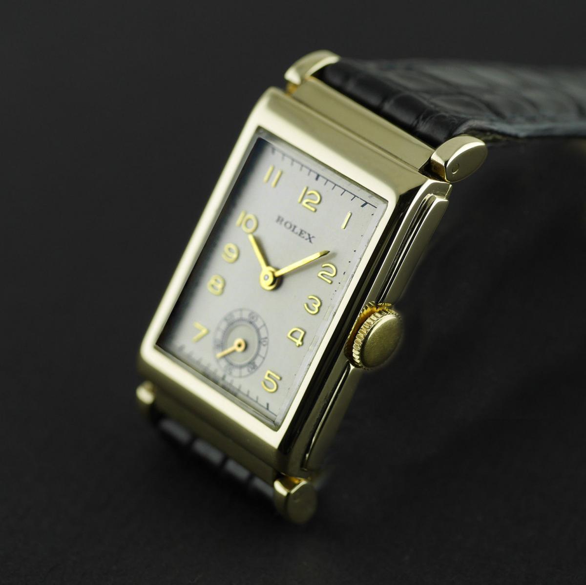 Rolex, Art Deco, Gold dated 1937 With Articulated Lugs