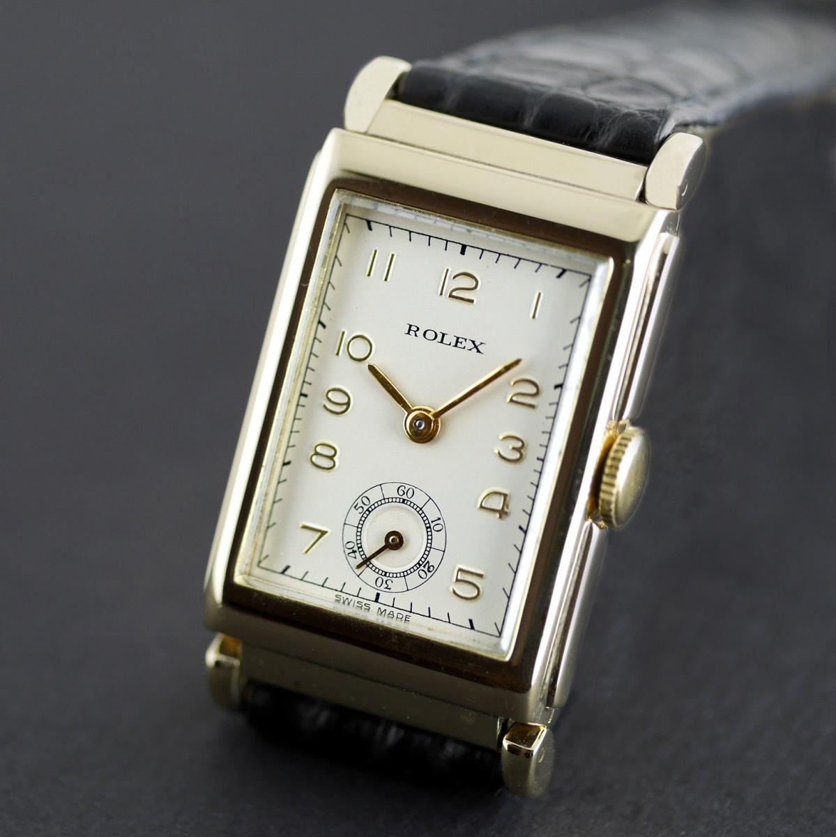 Rolex, Art Deco, Gold dated 1937 With Articulated Lugs