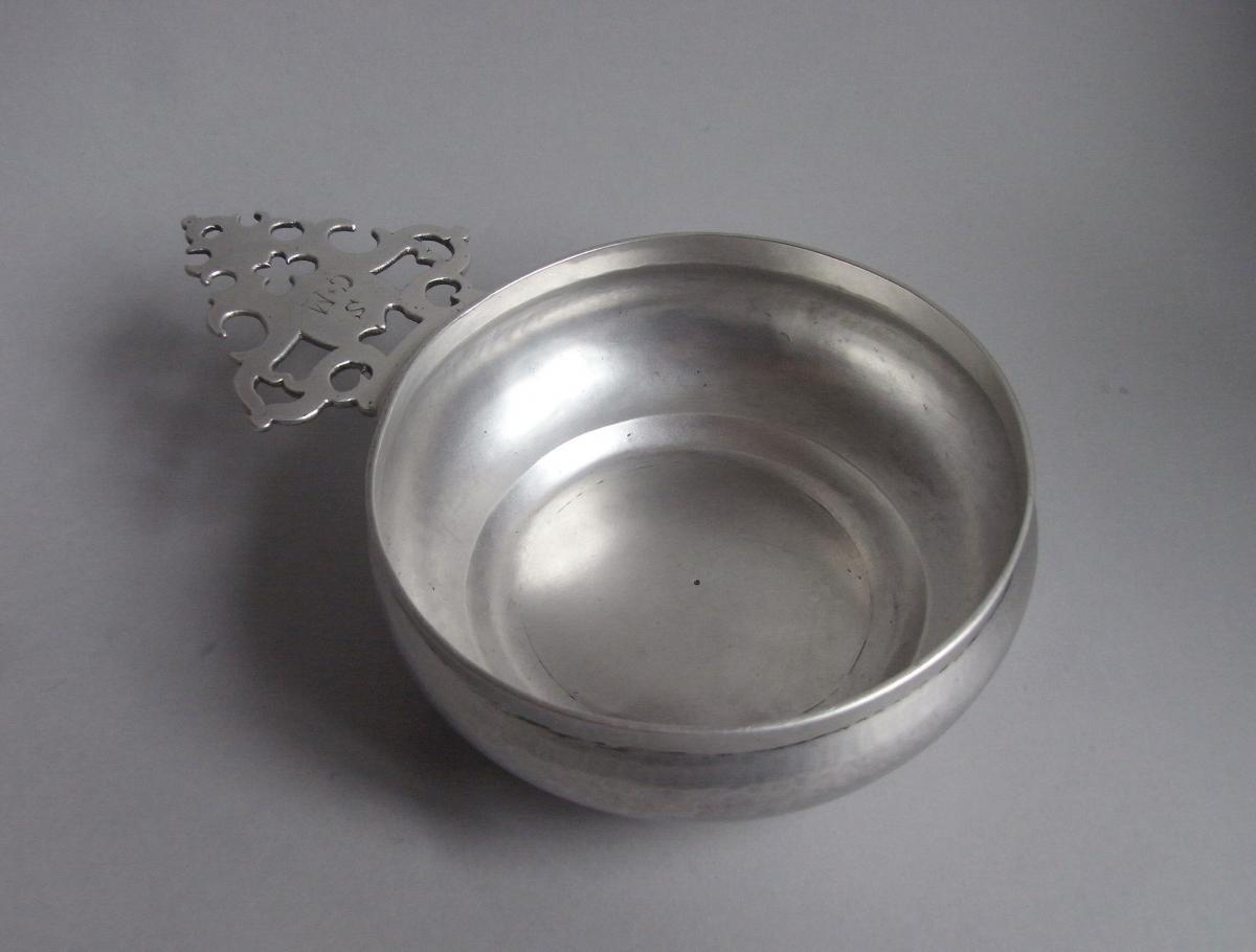 An extremely fine & rare William III Britannia Standard Side Handled Porringer made in London in 1701 by Matthew Madden