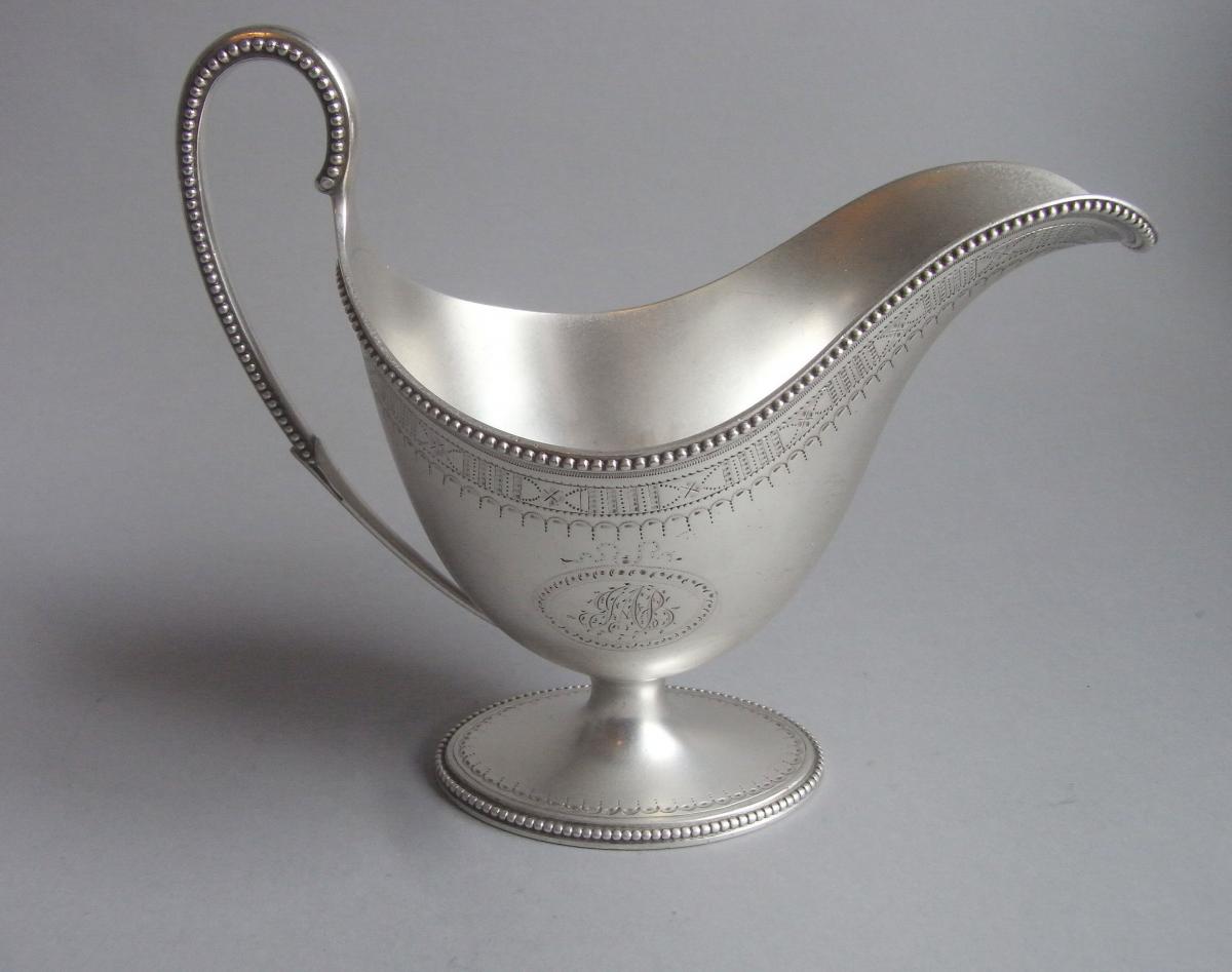 An outstanding and unusual George III Classical Sauceboat made in London in 1783 by John Denzilow