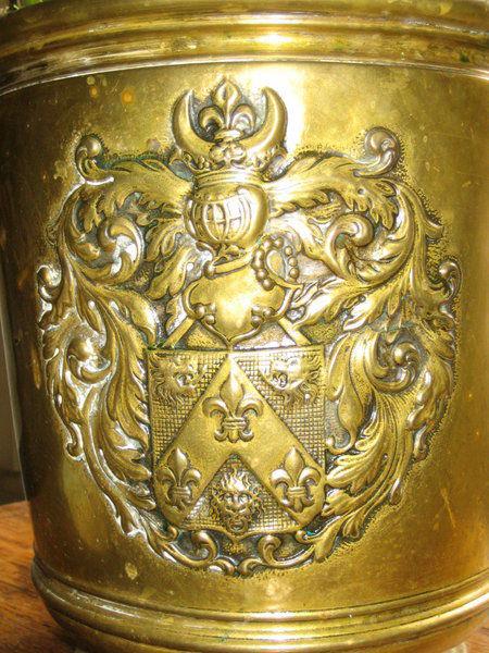 A 19th century brass repousse wine cooler