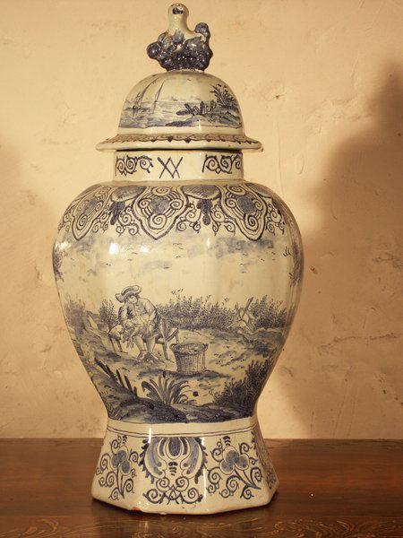 A 19th century, Dutch delftware vase and cover