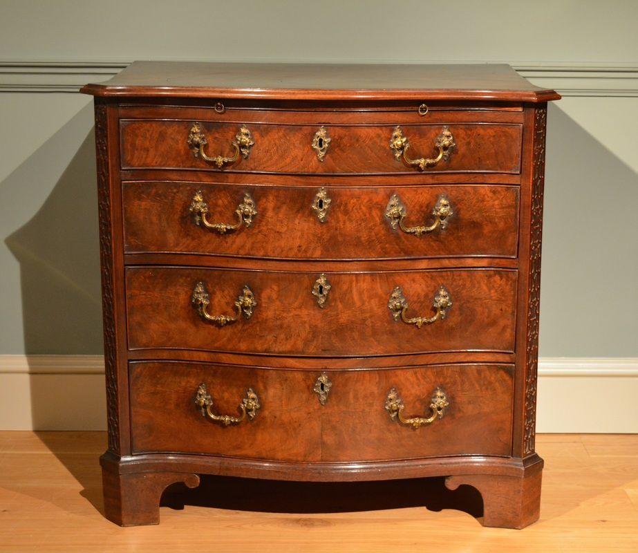 A fine small George III mahogany serpentine chest ​Circa 1760