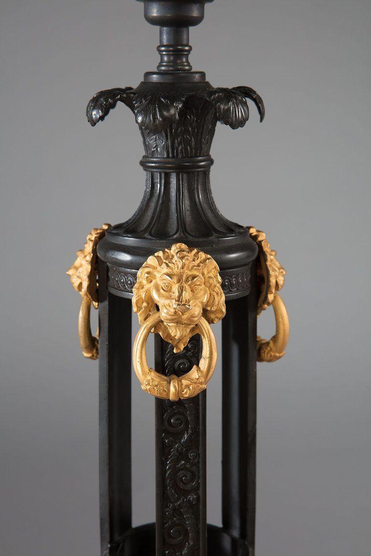 A Pair of Bronze and Ormolu Lamps