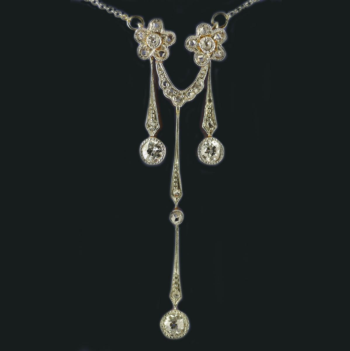 Edwardian Diamond Gold and Platinum Double Drop Pendant, Circa 1910
