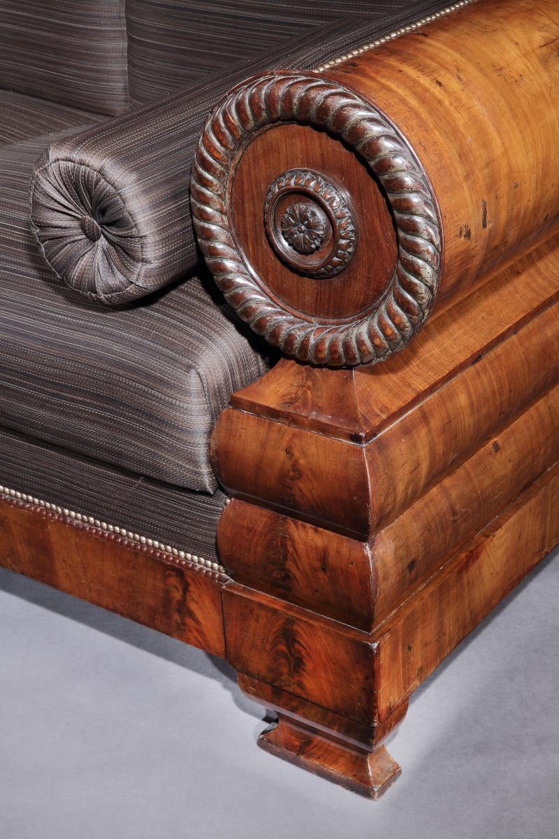 An early-19th century, mahogany 3 seater settee upholstered in horsehair