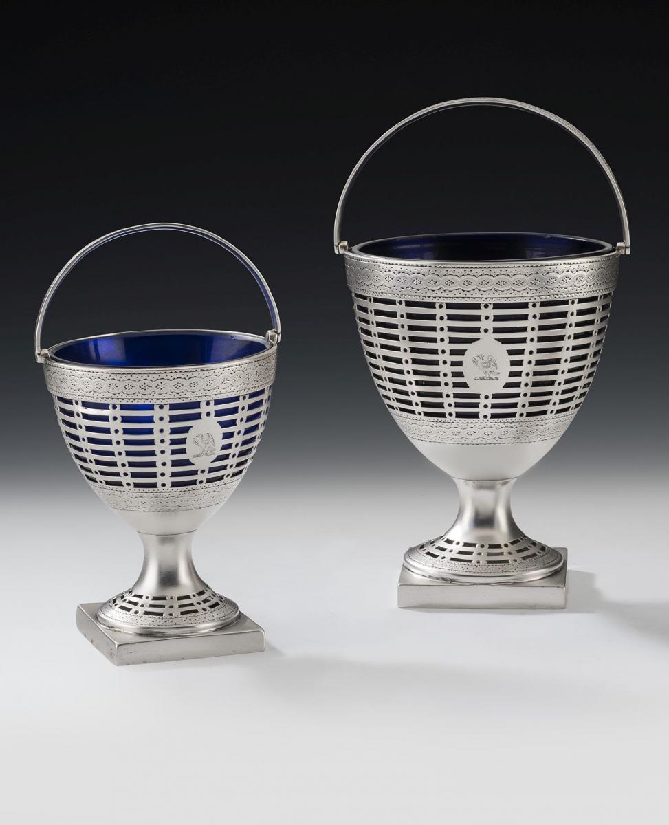 An extremely rare & fine Garniture of George III Neo Classical Baskets made in London in 1778 by Philip Freeman.