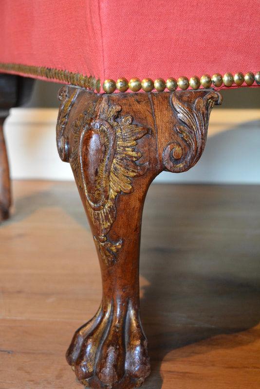 A carved mahogany parcel gilt Gainsborough chair