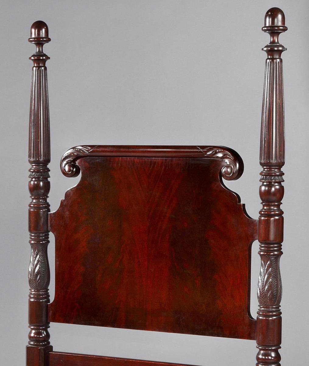 A pair of 19th century, mahogany, ‘antiquarian’, half-tester beds