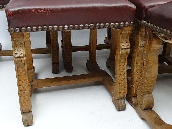 A set of eight Burgundian leather upholstered sidechairs